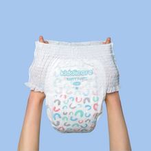 Load image into Gallery viewer, Kiddicare nappy pants held up against a light green background
