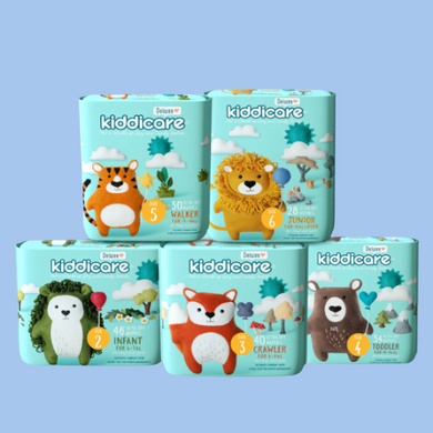 Four boxes of Kiddicare diapers with animal illustrations on a blue background